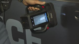 Floyd County Police using handheld xray camera to detect drugs hidden in vehicles [upl. by Ahsenal]