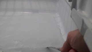 How to Unclog a Refrigerator Drain Line [upl. by Odranar]