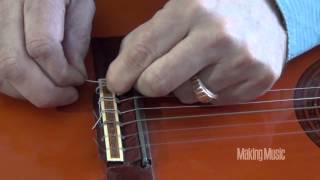 How to Restring a Classical Guitar [upl. by Boonie660]