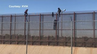 Video shows people climbing fence at border [upl. by Averyl]