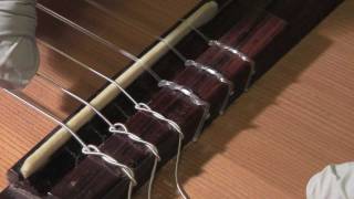 How to restring a classical guitar [upl. by Idou]