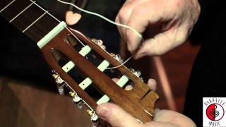 How to Restring a Classical Guitar [upl. by Ebeohp494]